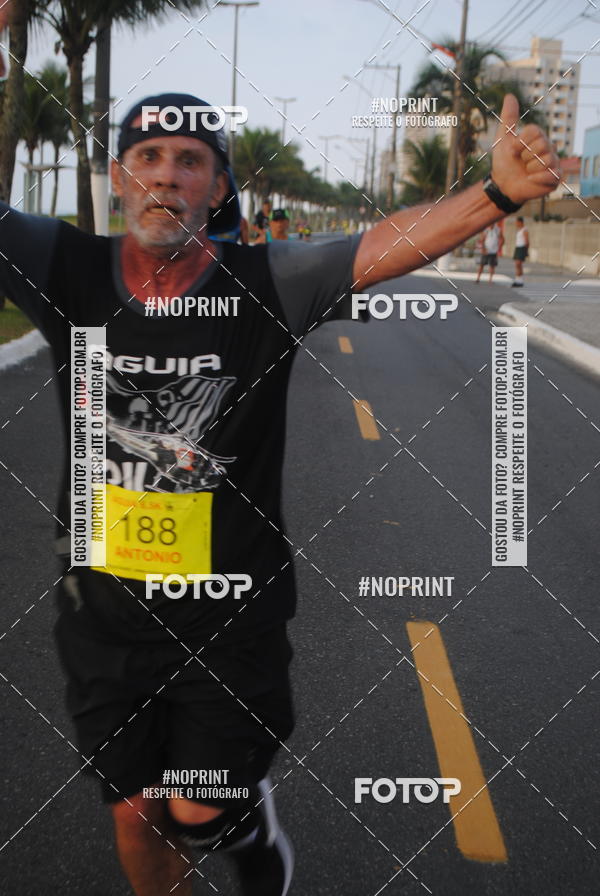 Buy your photos of the eventguia 13K Praia Grande on Fotop