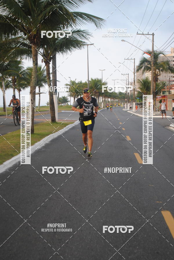 Buy your photos of the eventguia 13K Praia Grande on Fotop