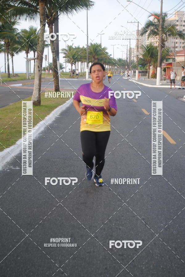 Buy your photos of the eventguia 13K Praia Grande on Fotop