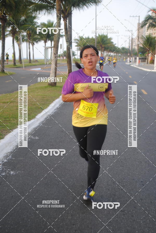 Buy your photos of the eventguia 13K Praia Grande on Fotop
