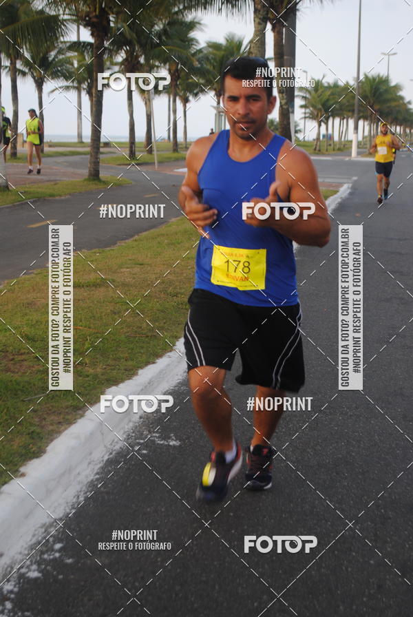 Buy your photos of the eventguia 13K Praia Grande on Fotop
