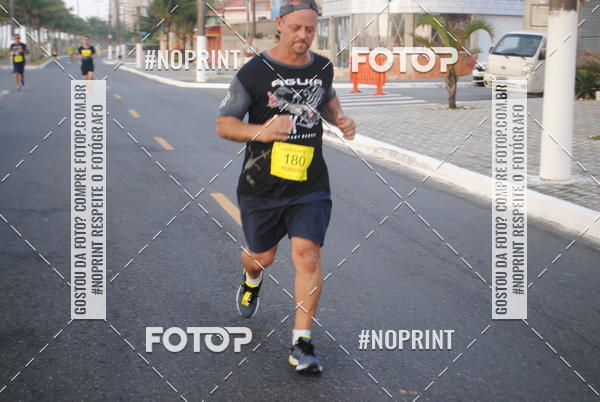 Buy your photos of the eventguia 13K Praia Grande on Fotop