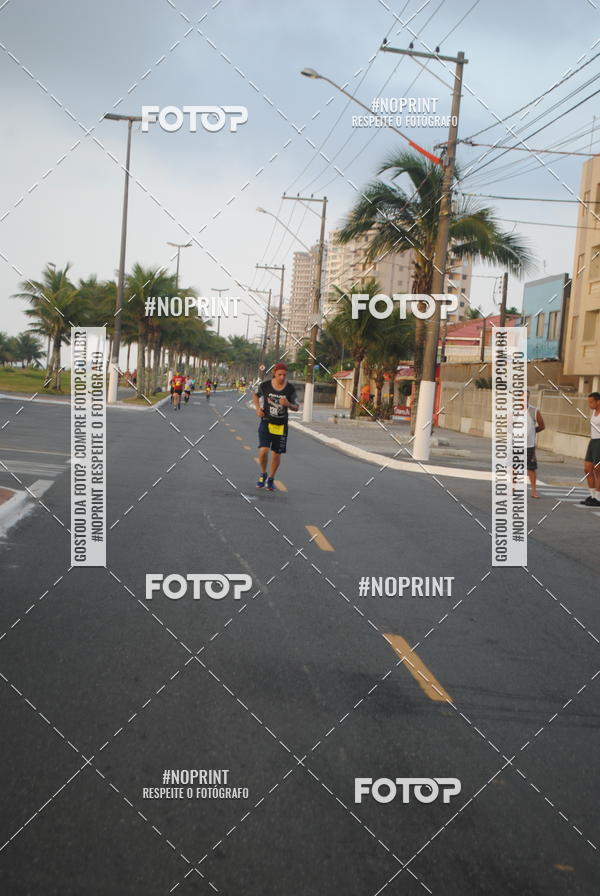 Buy your photos of the eventguia 13K Praia Grande on Fotop
