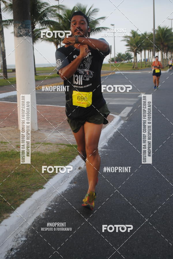 Buy your photos of the eventguia 13K Praia Grande on Fotop