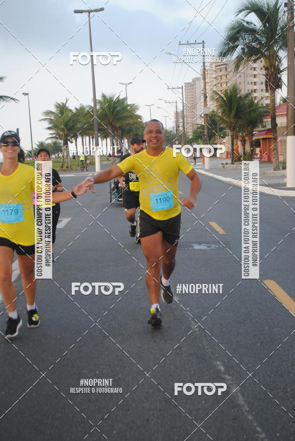 Buy your photos of the eventguia 13K Praia Grande on Fotop