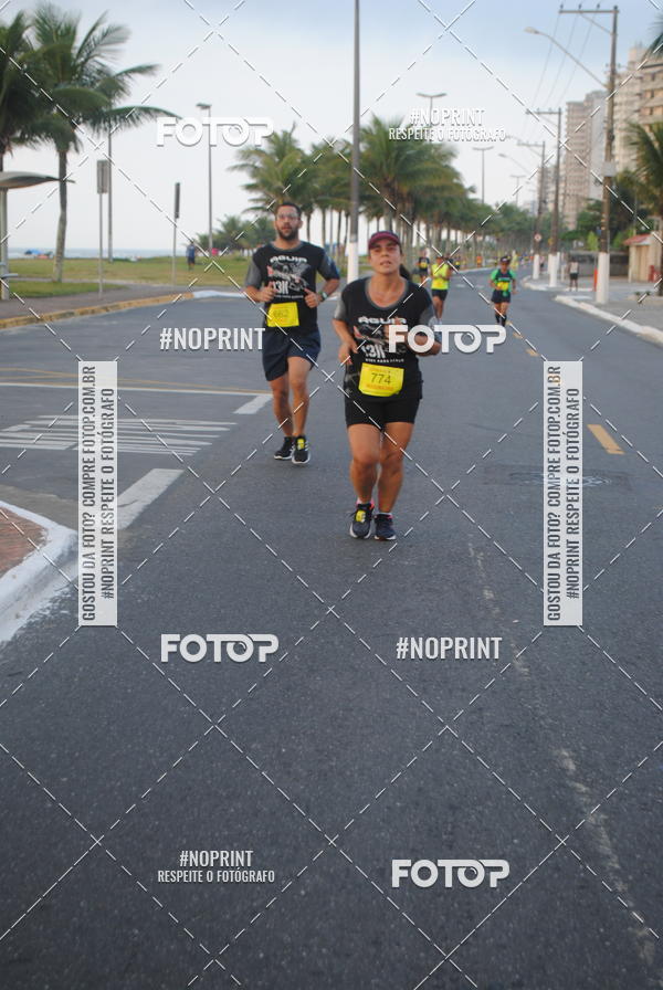 Buy your photos of the eventguia 13K Praia Grande on Fotop