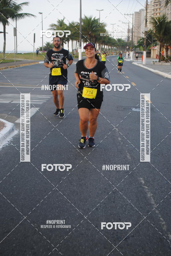 Buy your photos of the eventguia 13K Praia Grande on Fotop