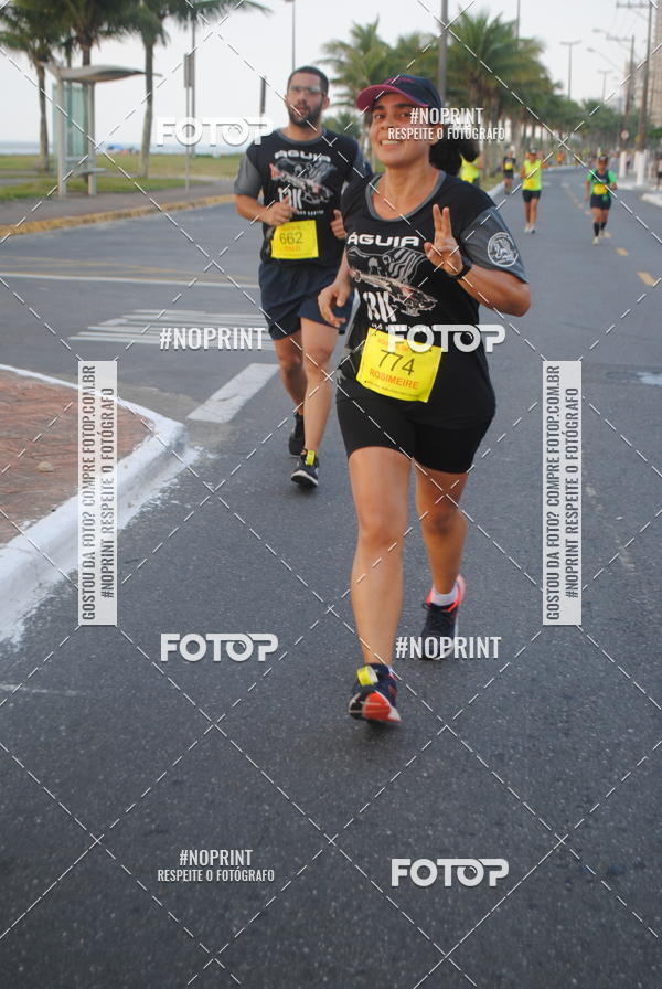 Buy your photos of the eventguia 13K Praia Grande on Fotop