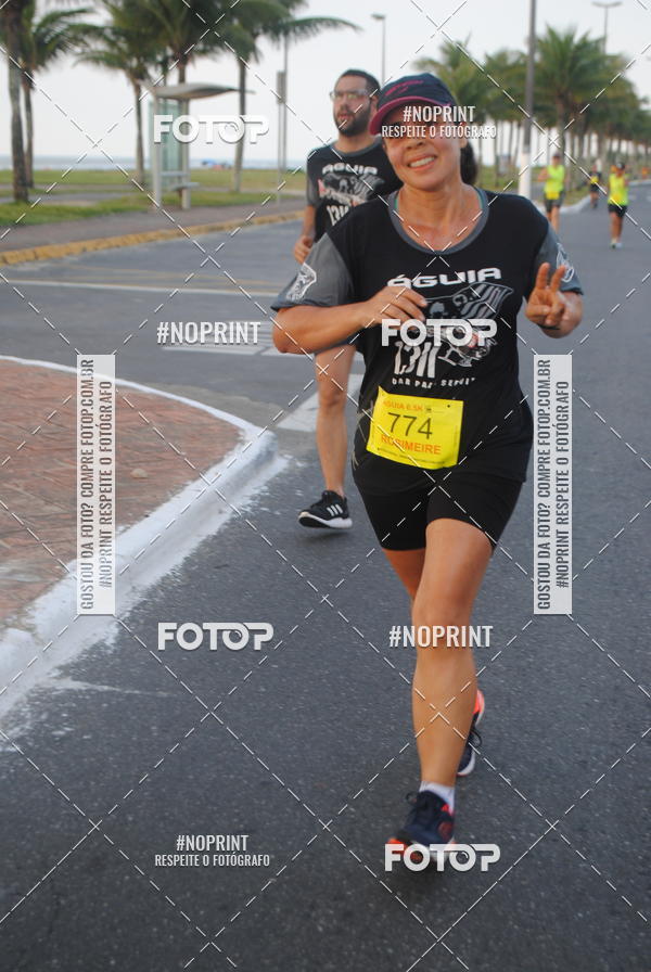 Buy your photos of the eventguia 13K Praia Grande on Fotop