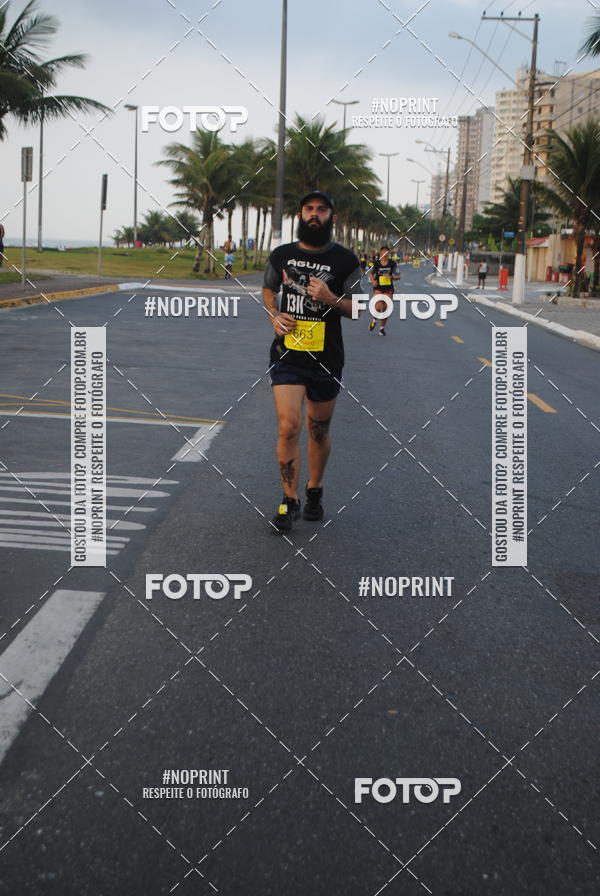 Buy your photos of the eventguia 13K Praia Grande on Fotop