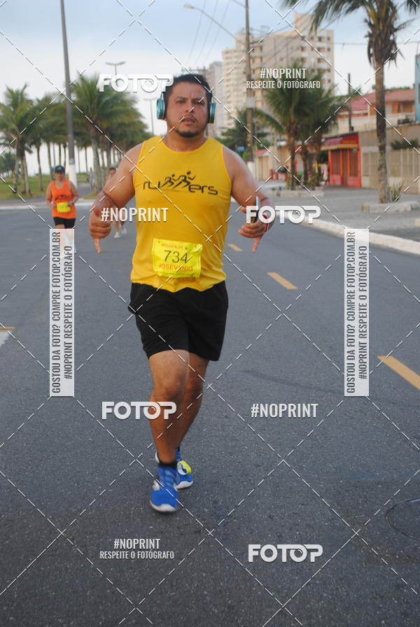 Buy your photos of the eventguia 13K Praia Grande on Fotop