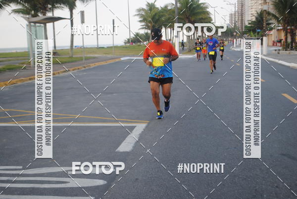 Buy your photos of the eventguia 13K Praia Grande on Fotop