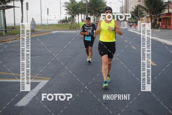 Buy your photos of the eventguia 13K Praia Grande on Fotop