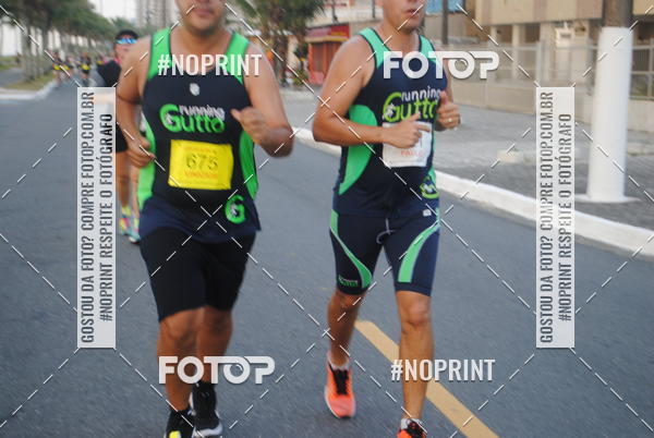 Buy your photos of the eventguia 13K Praia Grande on Fotop
