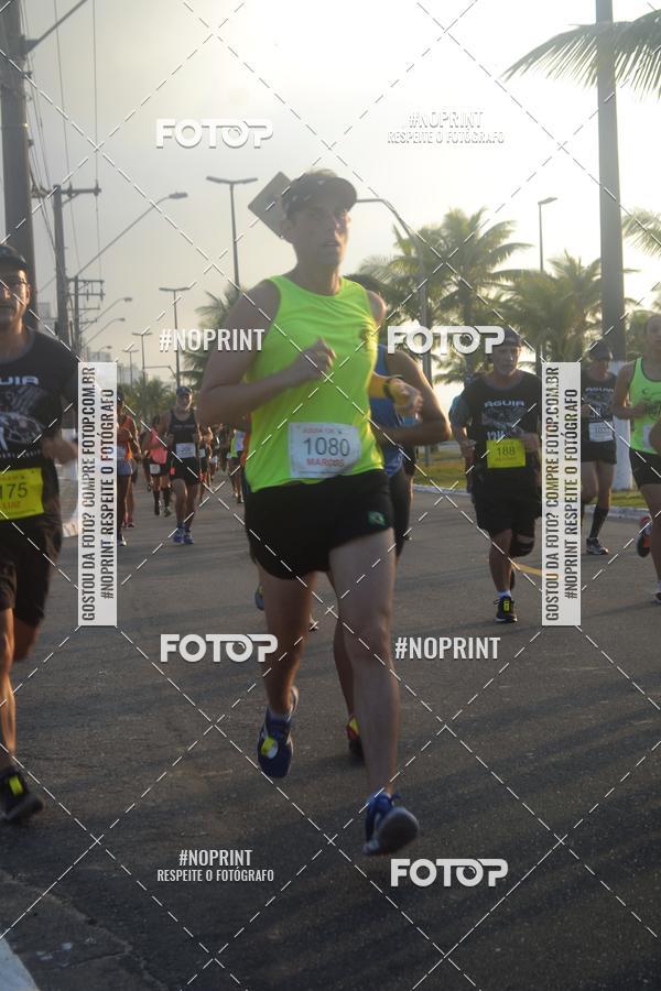 Buy your photos of the eventguia 13K Praia Grande on Fotop