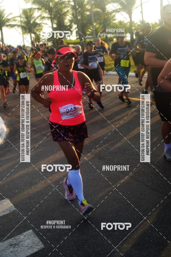 Buy your photos of the eventguia 13K Praia Grande on Fotop