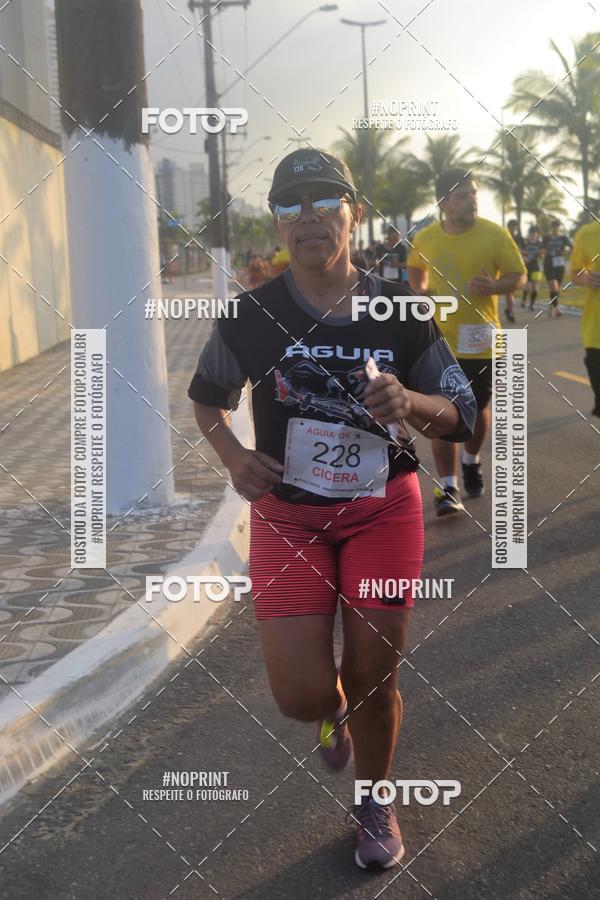 Buy your photos of the eventguia 13K Praia Grande on Fotop