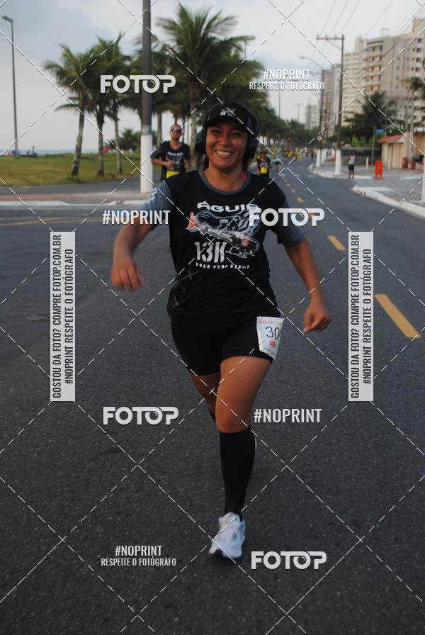 Buy your photos of the eventguia 13K Praia Grande on Fotop