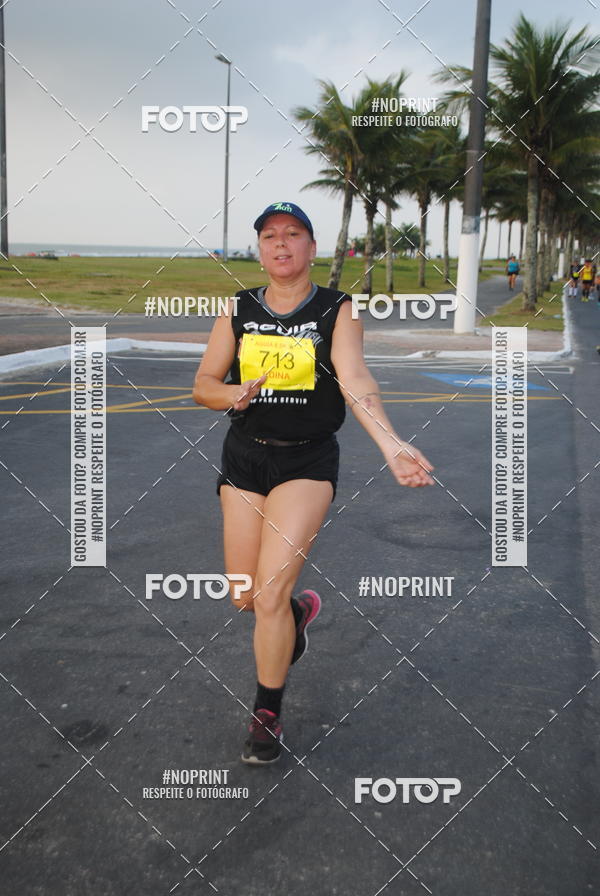 Buy your photos of the eventguia 13K Praia Grande on Fotop