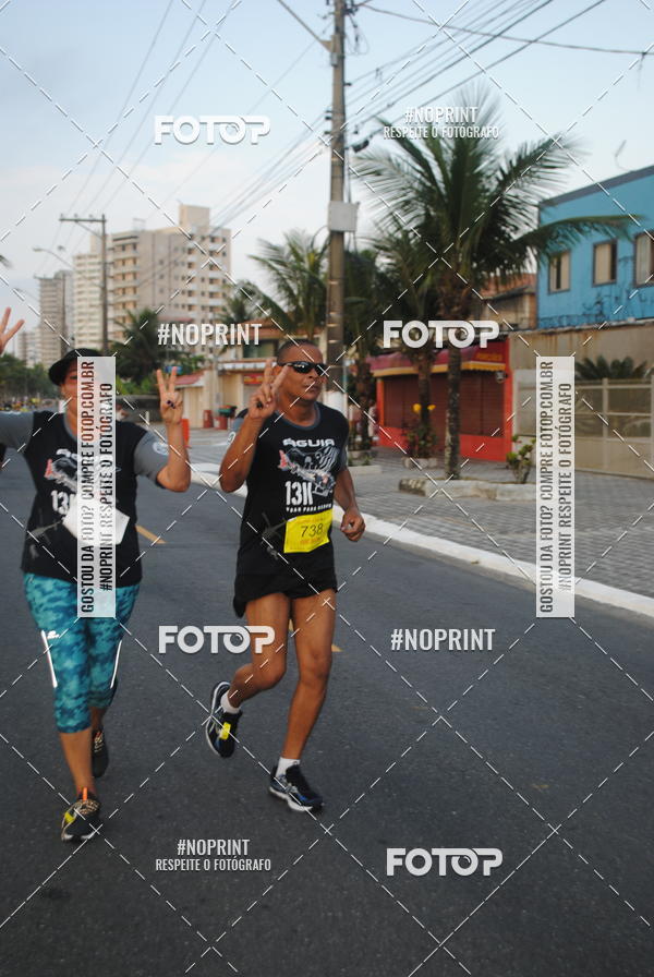 Buy your photos of the eventguia 13K Praia Grande on Fotop
