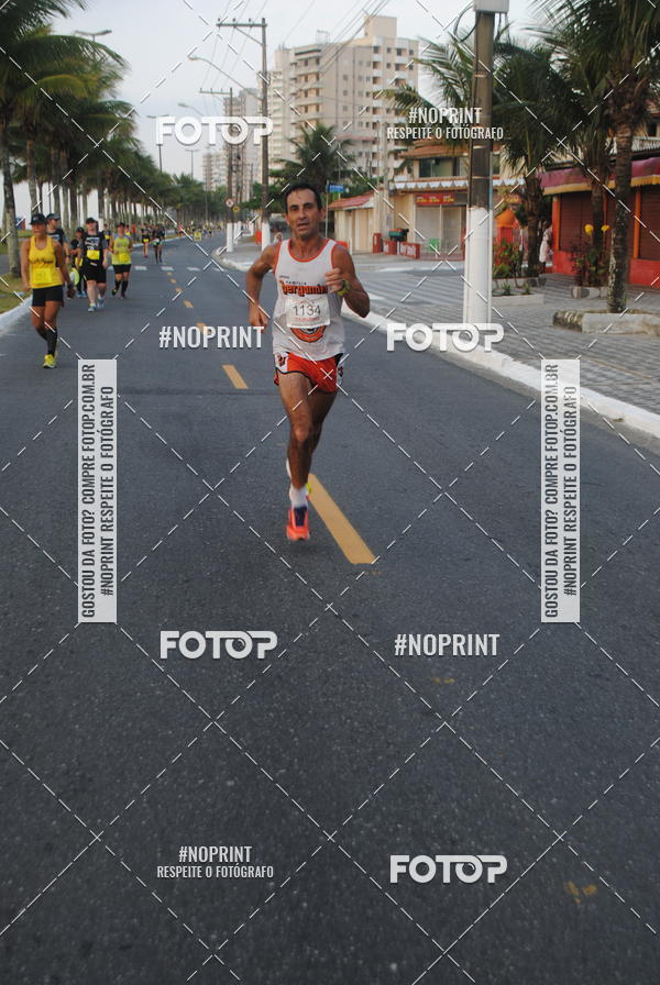 Buy your photos of the eventguia 13K Praia Grande on Fotop