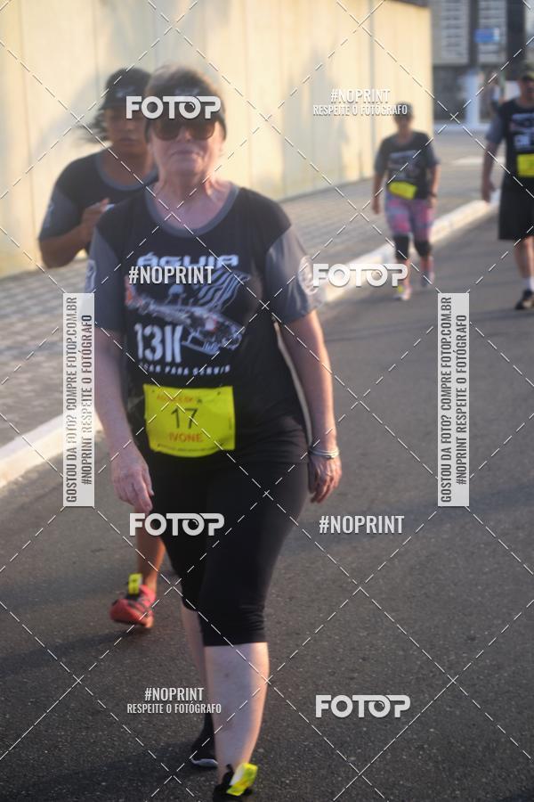 Buy your photos of the eventguia 13K Praia Grande on Fotop