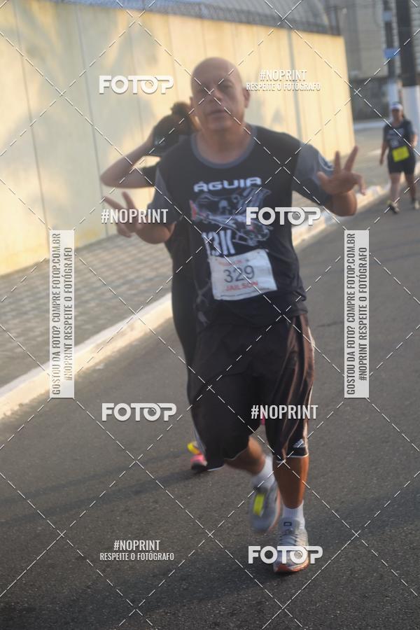 Buy your photos of the eventguia 13K Praia Grande on Fotop