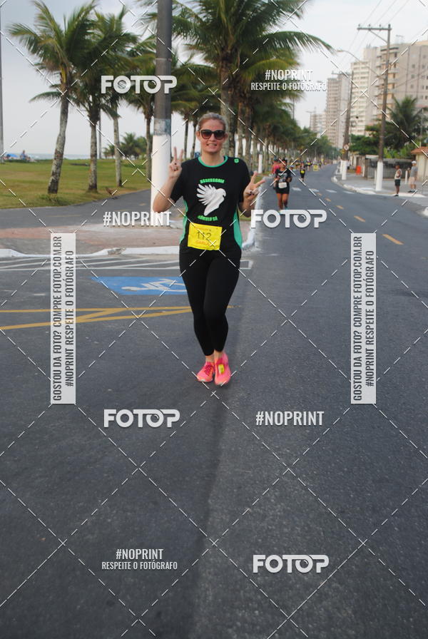 Buy your photos of the eventguia 13K Praia Grande on Fotop