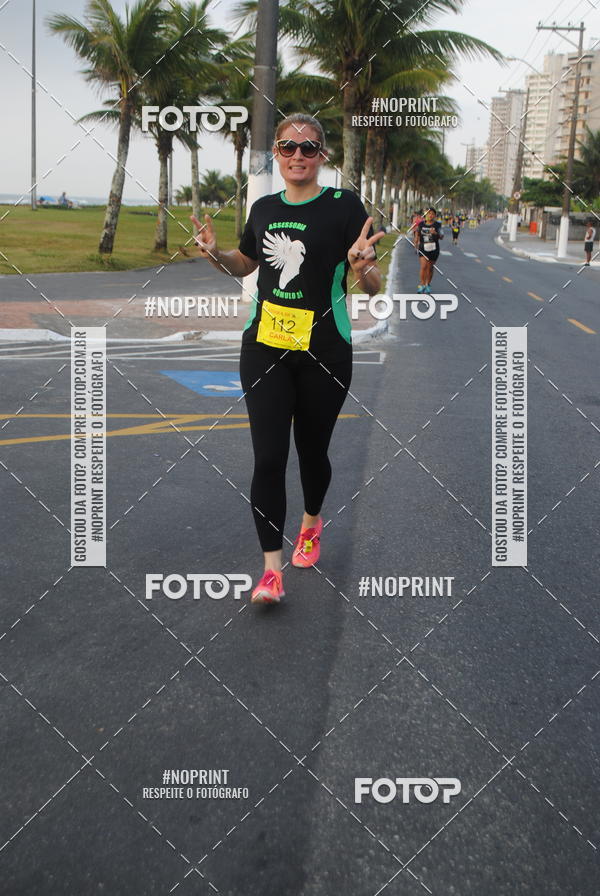 Buy your photos of the eventguia 13K Praia Grande on Fotop