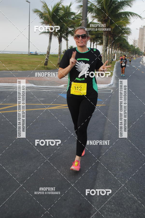 Buy your photos of the eventguia 13K Praia Grande on Fotop