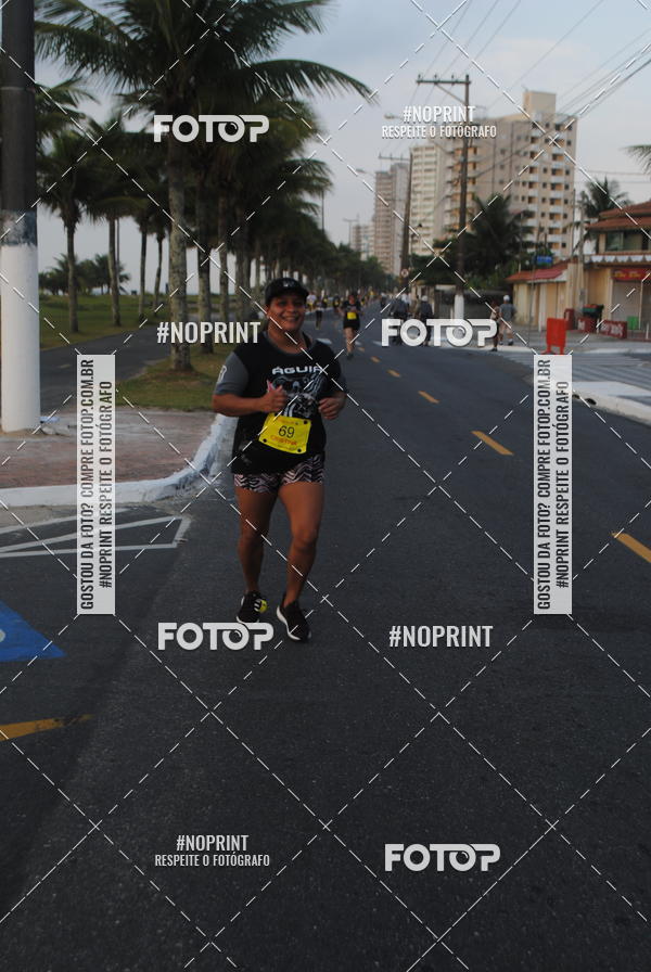 Buy your photos of the eventguia 13K Praia Grande on Fotop