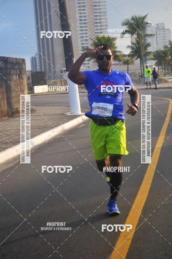 Buy your photos of the eventguia 13K Praia Grande on Fotop