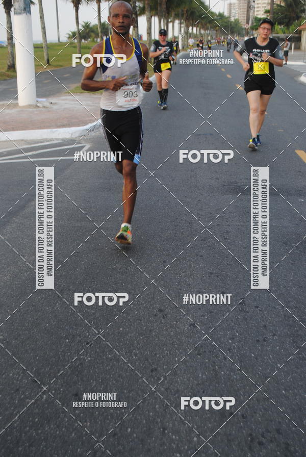 Buy your photos of the eventguia 13K Praia Grande on Fotop