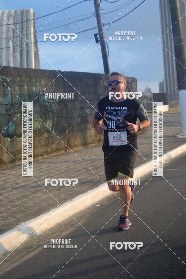 Buy your photos of the eventguia 13K Praia Grande on Fotop