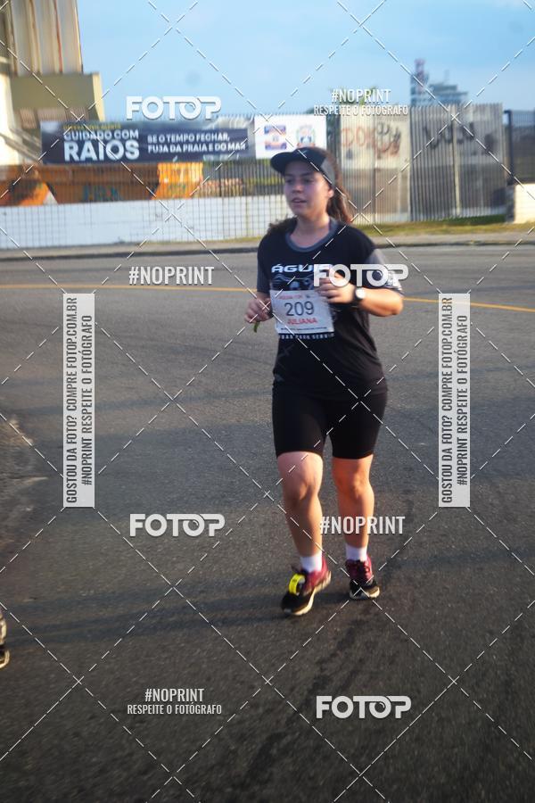 Buy your photos of the eventguia 13K Praia Grande on Fotop