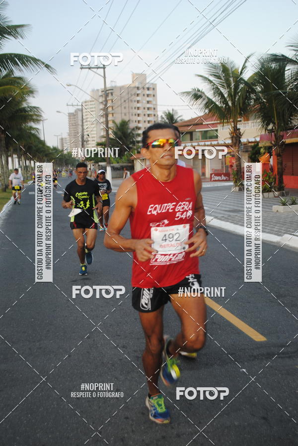 Buy your photos of the eventguia 13K Praia Grande on Fotop