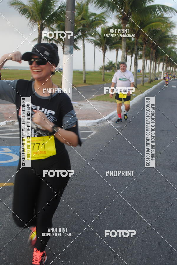 Buy your photos of the eventguia 13K Praia Grande on Fotop