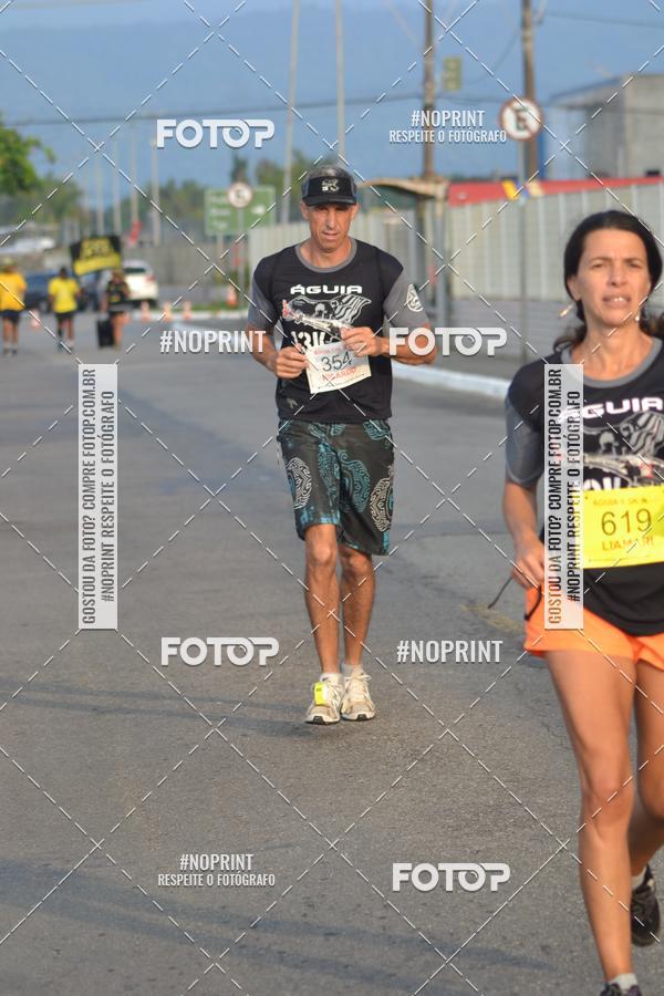 Buy your photos of the eventguia 13K Praia Grande on Fotop