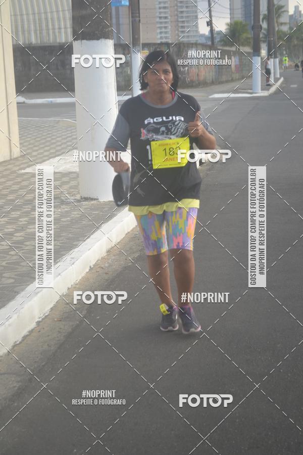 Buy your photos of the eventguia 13K Praia Grande on Fotop