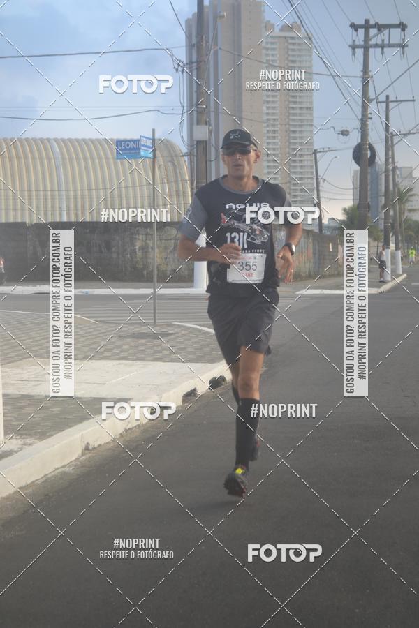 Buy your photos of the eventguia 13K Praia Grande on Fotop