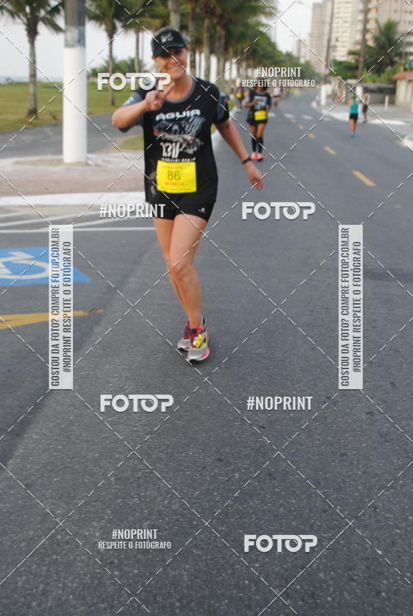 Buy your photos of the eventguia 13K Praia Grande on Fotop
