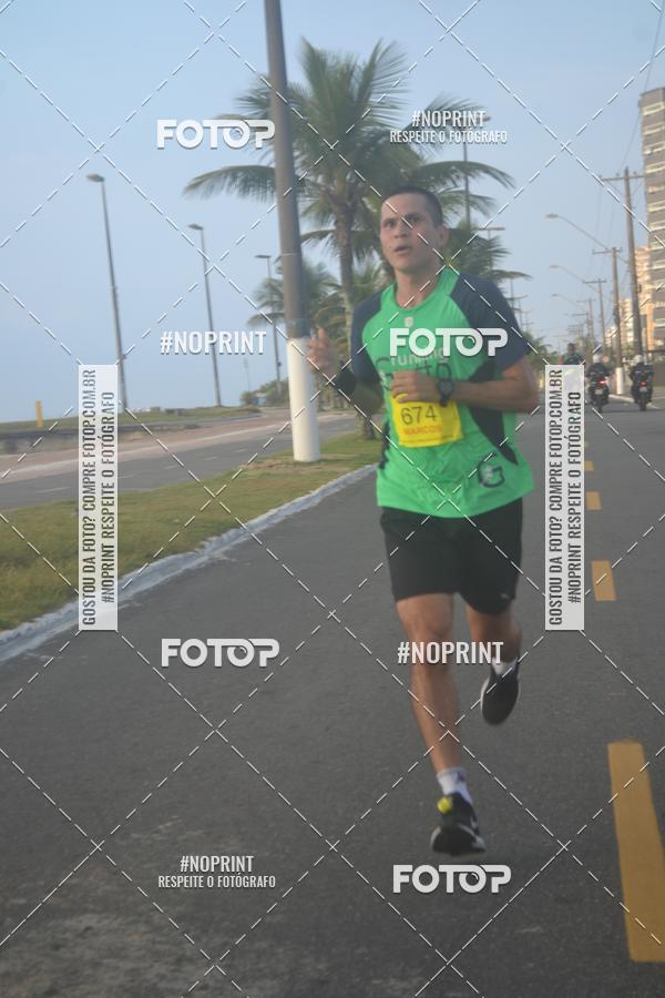 Buy your photos of the eventguia 13K Praia Grande on Fotop