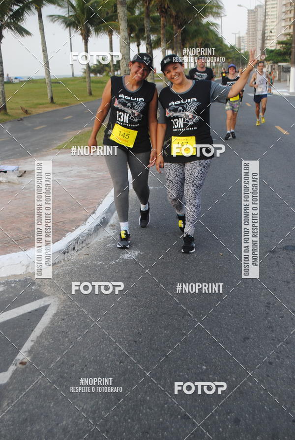 Buy your photos of the eventguia 13K Praia Grande on Fotop