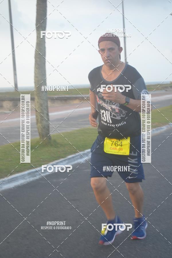 Buy your photos of the eventguia 13K Praia Grande on Fotop