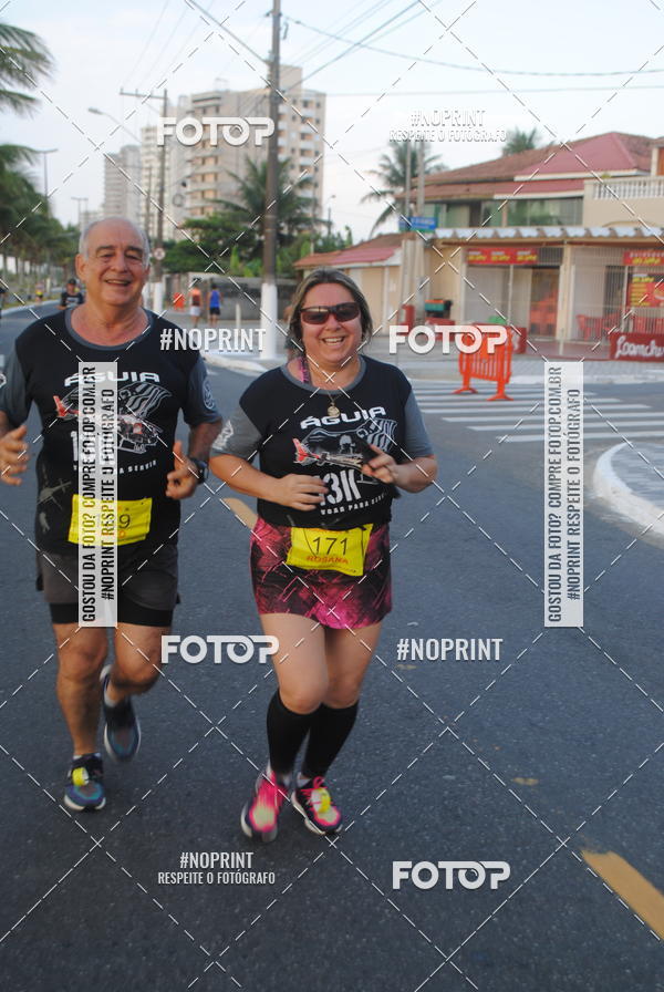 Buy your photos of the eventguia 13K Praia Grande on Fotop