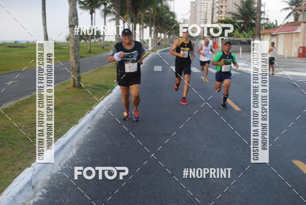 Buy your photos of the eventguia 13K Praia Grande on Fotop