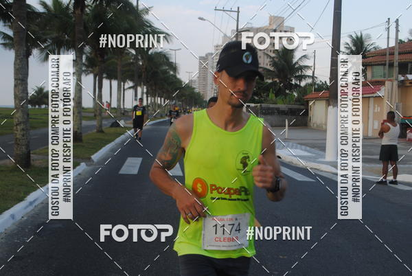 Buy your photos of the eventguia 13K Praia Grande on Fotop