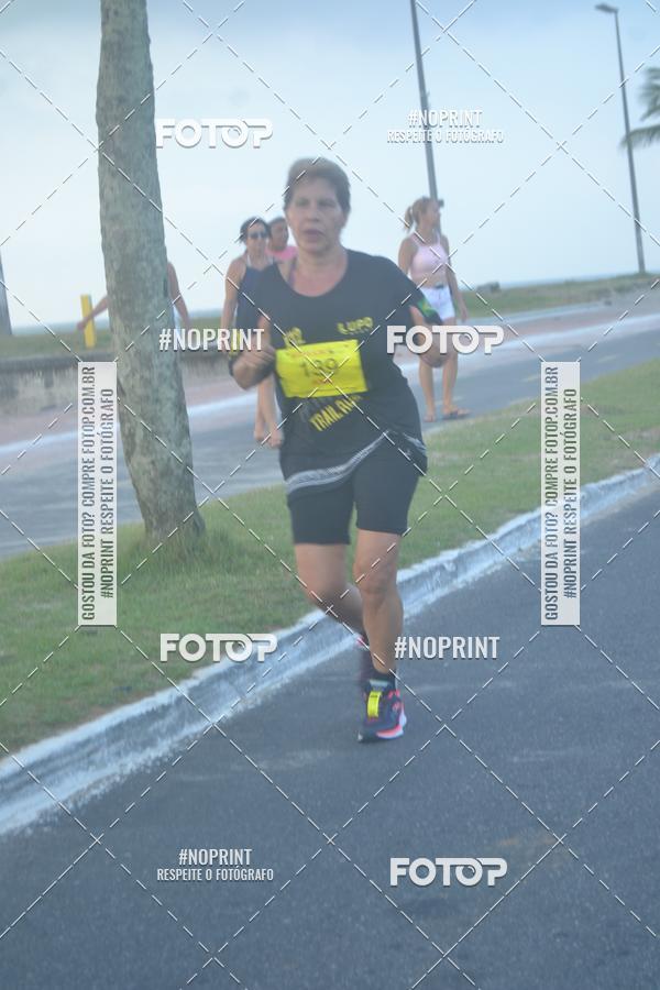 Buy your photos of the eventguia 13K Praia Grande on Fotop