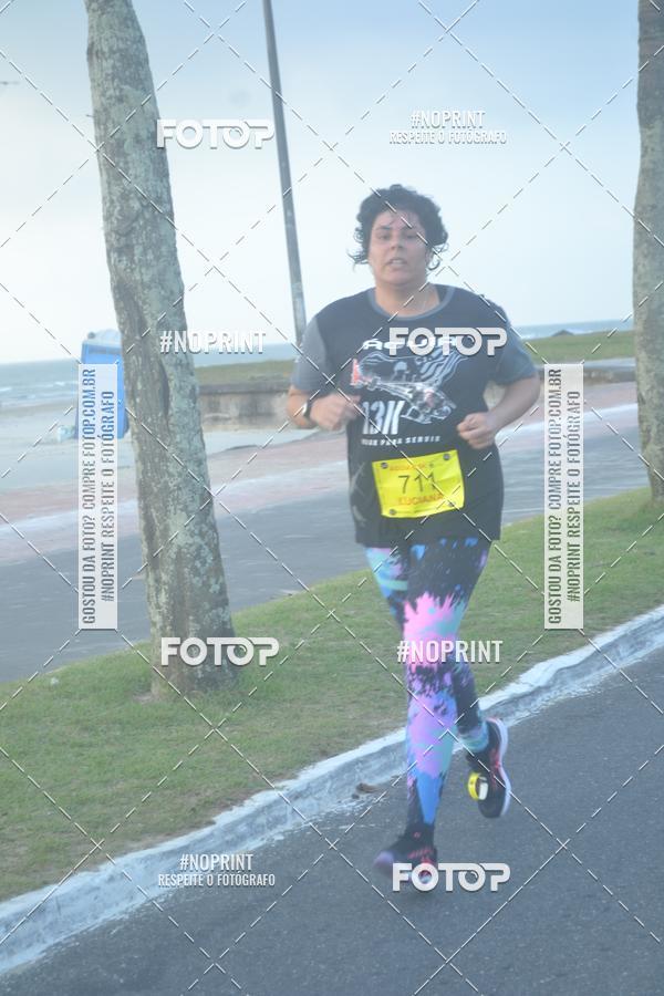 Buy your photos of the eventguia 13K Praia Grande on Fotop