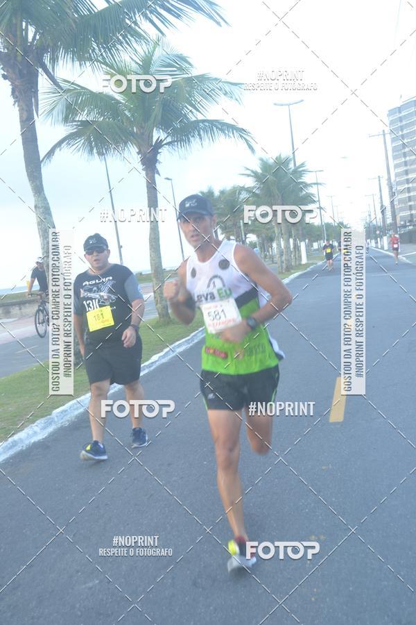 Buy your photos of the eventguia 13K Praia Grande on Fotop